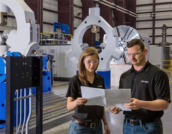 Jennifer Gaines, mechanical design engineer at Sulzer with a colleague in the factury of Sulzer La Porte, TX, USA