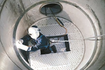 Sulzer employee in a column