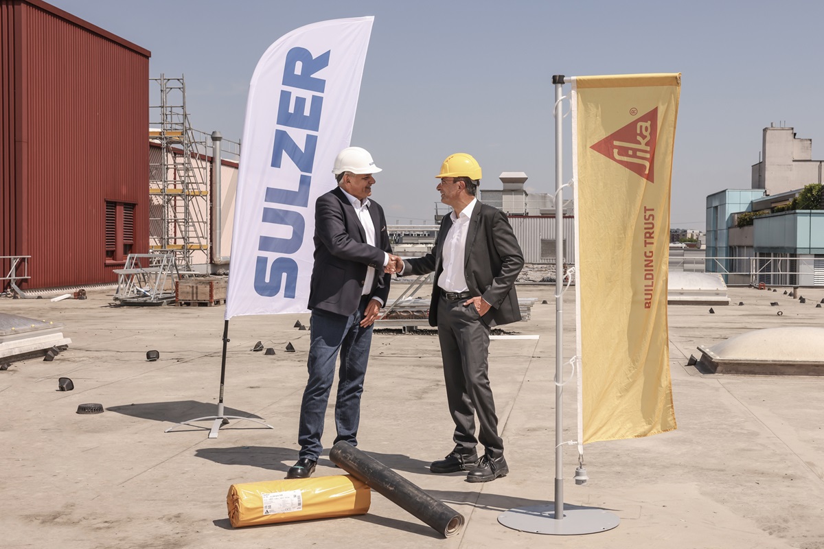 Representatives from Sika and Sulzer shaking hands