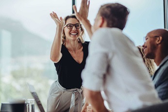High five in a team meeting