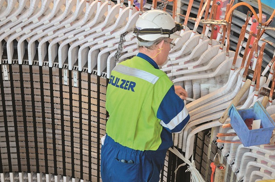 Engineer rebuilding the stator