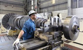 People working on a generator