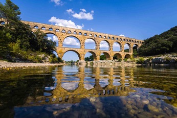 Pont du Gard aqueduct in France with water in the front