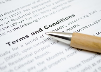 Terms and conditions document with pen