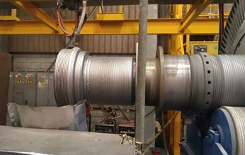 The coupling repair process began with submerged-arc welding.