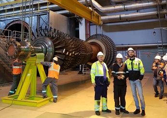Field service team takes rotor out.