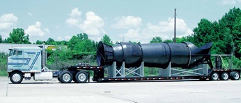 After extensive repair and upgrade, one of the water pumps is transported back to the customer. 