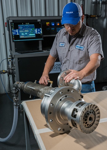 Fuel nozzles with steam injection on high flow test bench