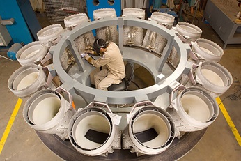 Service engineer checking gas turbine components