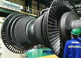 Steam turbine rotor balancing before assembly.