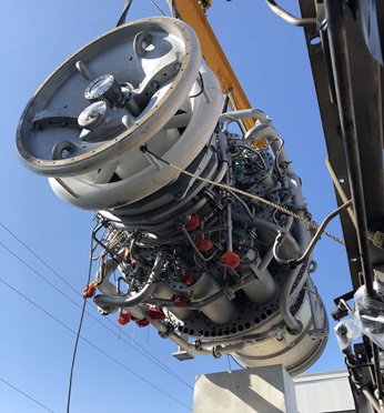 Gas turbine thermal block being lifted for installation.