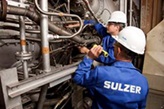 Sulzer engineers donig maintenance