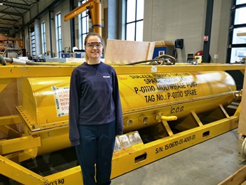 Female apprentice Celina Thuro with yellow Sulzer pump