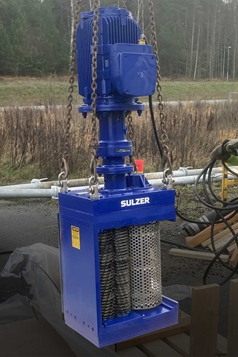 The Sulzer CMD Channel Monster grinder about to be lowered into position