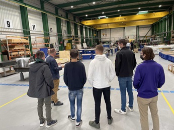Students having a tour of Sulzer workshop