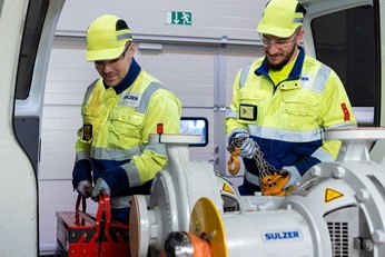 Men loading service van