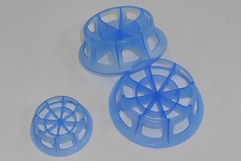 Three plastic C-Ring™ in different sizes for random packing 