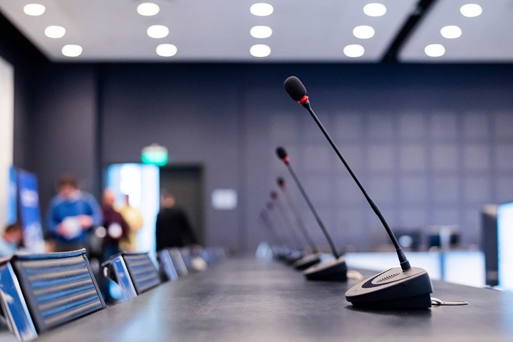 Empty table with microphones