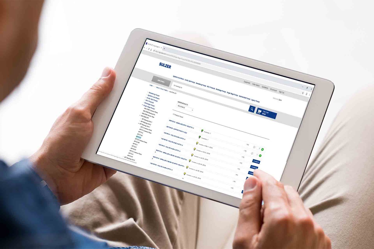 Man is watching PumpsOnline website via tablet