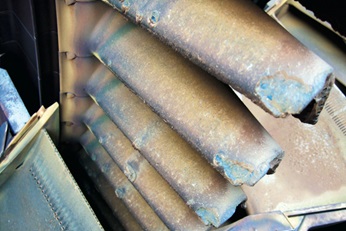 Hot corrosion damage in first-stage gas turbine blades