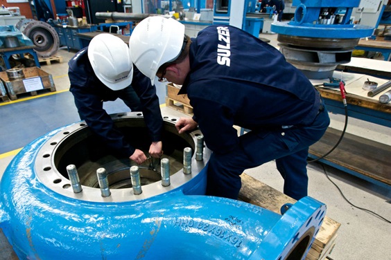 Sulzer service technicians servicing a pump