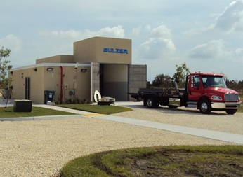Building with a truck in front of it