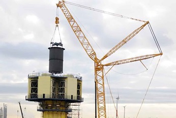 Major revamp of a tower with several cranes