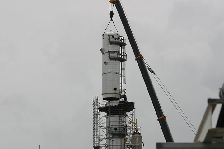 Placing a field fabricated column part with a crane at the customer mill