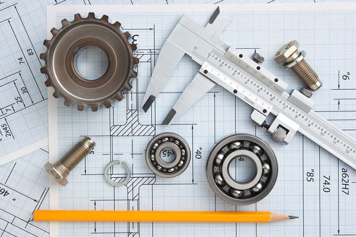 Gears and Rulers on a technical drawing.