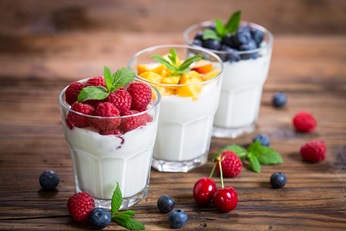 Yogurt with fruit in glass cups