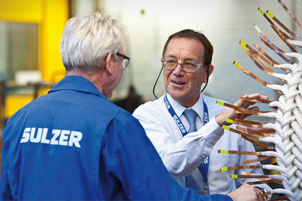 Two engineers at the service center in Birmingham, UK