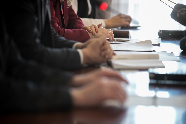 hands and documents in a meeting situation