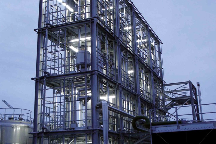 Skid-mounted installation illuminated with four floors