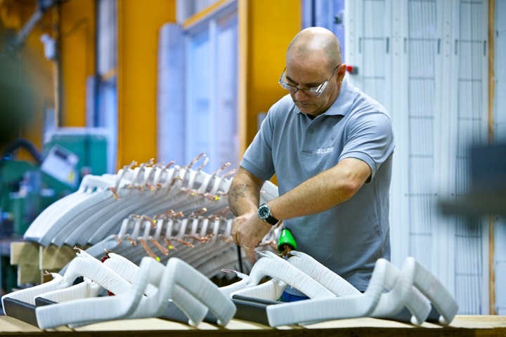 Sulzer employee working with coils