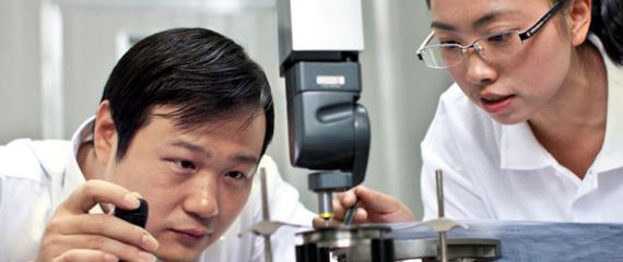 Two people working in a test lab