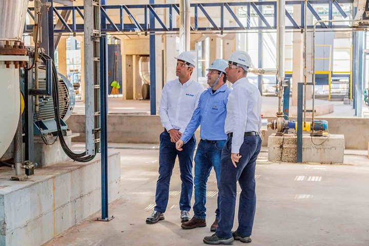 Three guys inside the corn ethanol factory